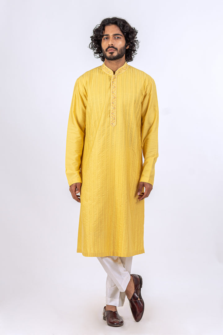 YELLOW ALLOVER PATCH LINE WITH EMBROIDERED PLACKRT KURTA (only kurta)
