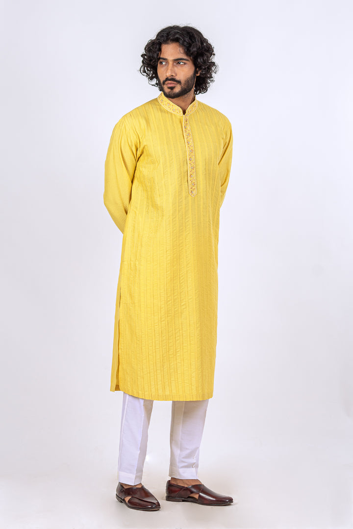YELLOW ALLOVER PATCH LINE WITH EMBROIDERED PLACKRT KURTA (only kurta)