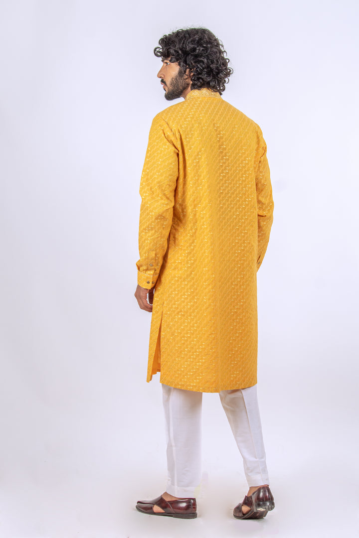 YELLOW MACHINE EMBROIDERD NECKLINE KURTA (only kurta)