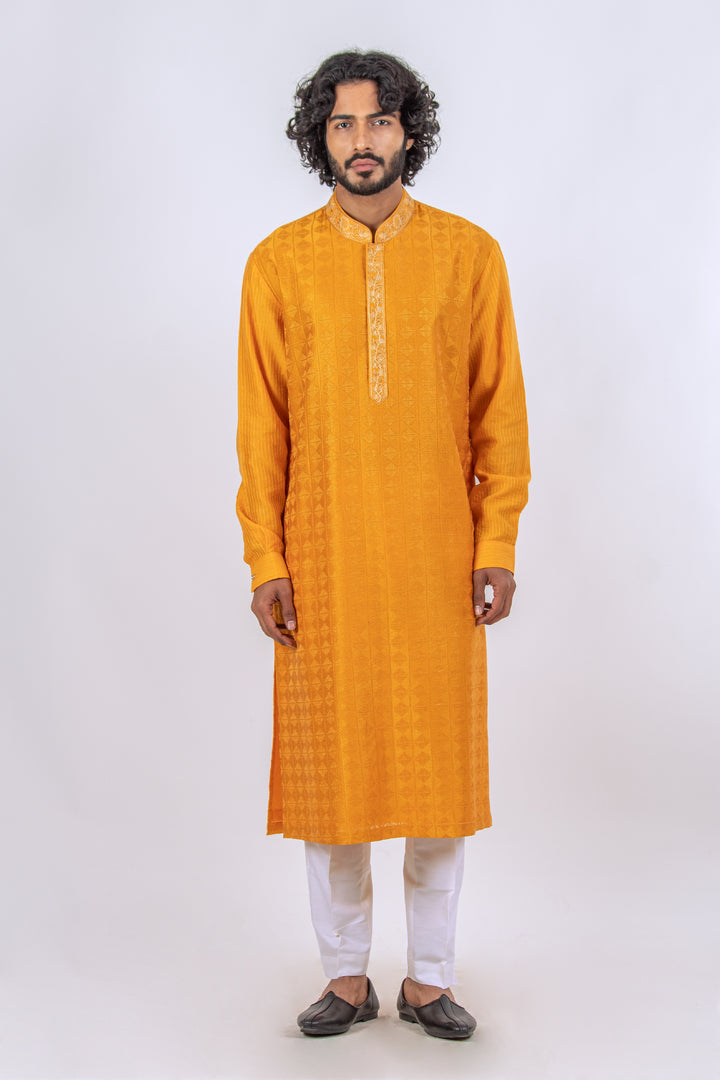 ORANGE ALLOVER MACHINE EMBROIDERY KURTA (only kurta)