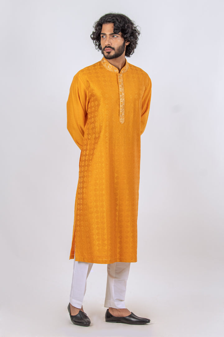 ORANGE ALLOVER MACHINE EMBROIDERY KURTA (only kurta)