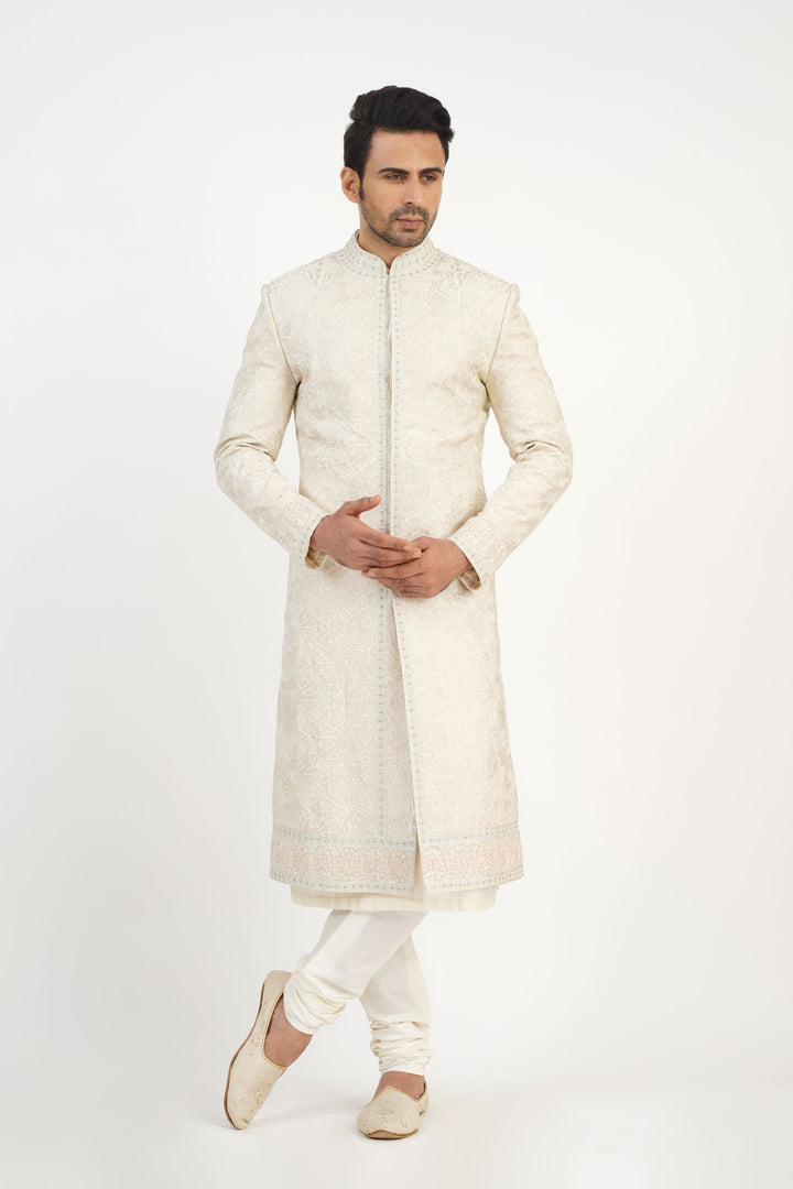 Ivory Heavy Machine Embroidered Sherwani Highlighted with sequince.