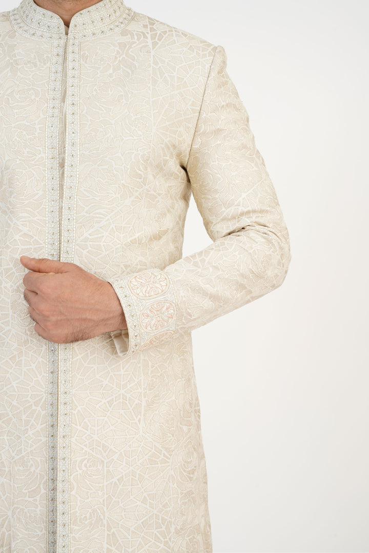 Ivory Heavy Machine Embroidered Sherwani Highlighted with sequince.