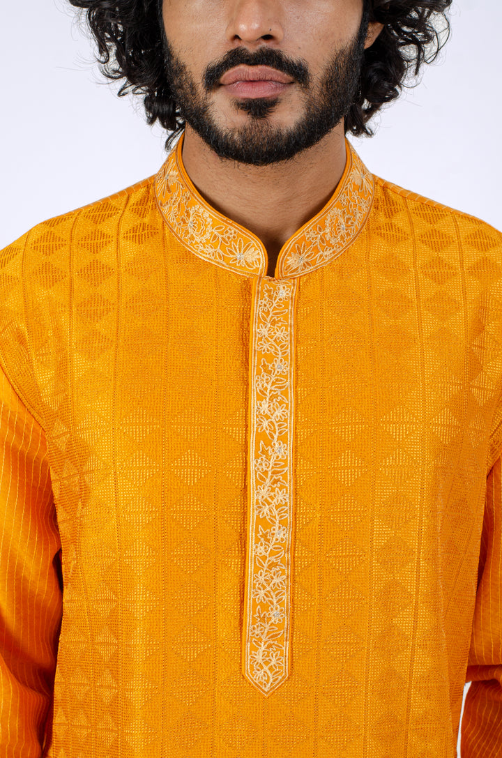 ORANGE ALLOVER MACHINE EMBROIDERY KURTA (only kurta)