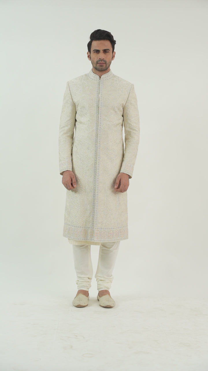 Ivory Heavy Machine Embroidered Sherwani Highlighted with sequince.