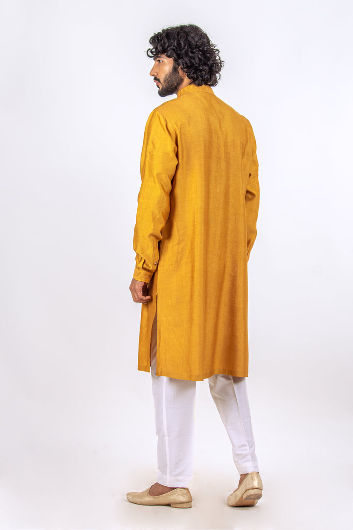 MUSTARD YELLOW NECKLINE AND SIDE PINTUCK PANNEL KURTA (only kurta)