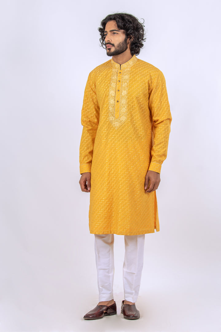 YELLOW MACHINE EMBROIDERD NECKLINE KURTA (only kurta)