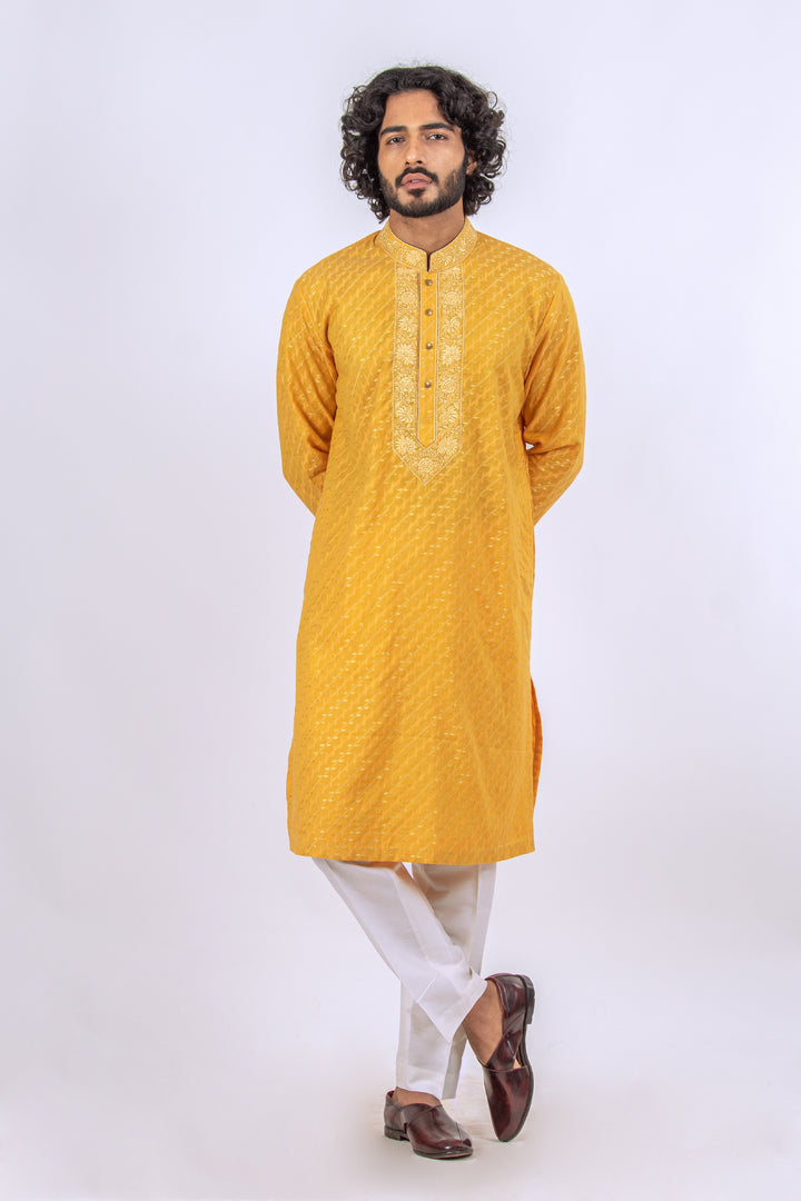 YELLOW MACHINE EMBROIDERD NECKLINE KURTA (only kurta)
