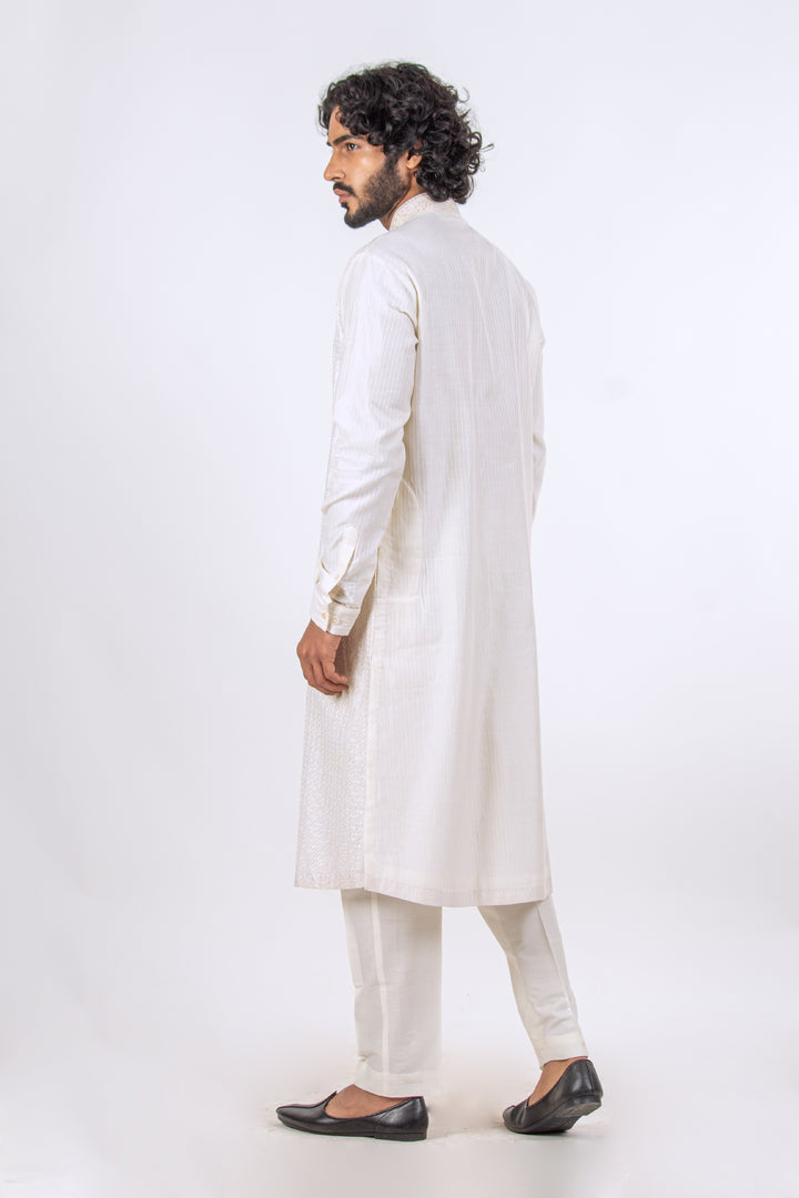 WHITE ALLOVER MACHINE EMBROIDERY KURTA (only kurta)