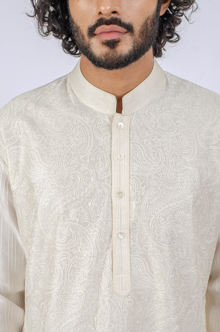 WHITE ALLOVER MACHINE EMBROIDERY KURTA (only kurta)