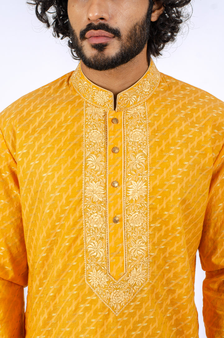 YELLOW MACHINE EMBROIDERD NECKLINE KURTA (only kurta)